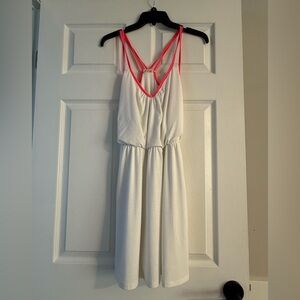White mini dress with pink straps